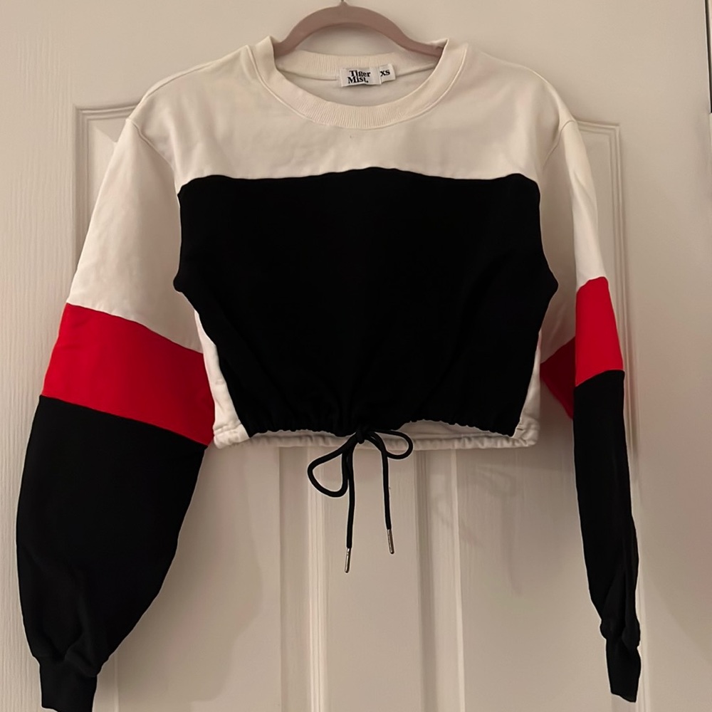 Tiger Mist cropped sweater with black and red strip trimming